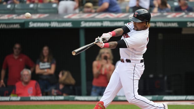 Sep 17, 2022; Cleveland, Ohio, USA; Cleveland Guardians third baseman Jose Ramirez (11) hits a home run during the first inning against the Minnesota Twins at Progressive Field. Mandatory Credit: Ken Blaze-USA TODAY Sports